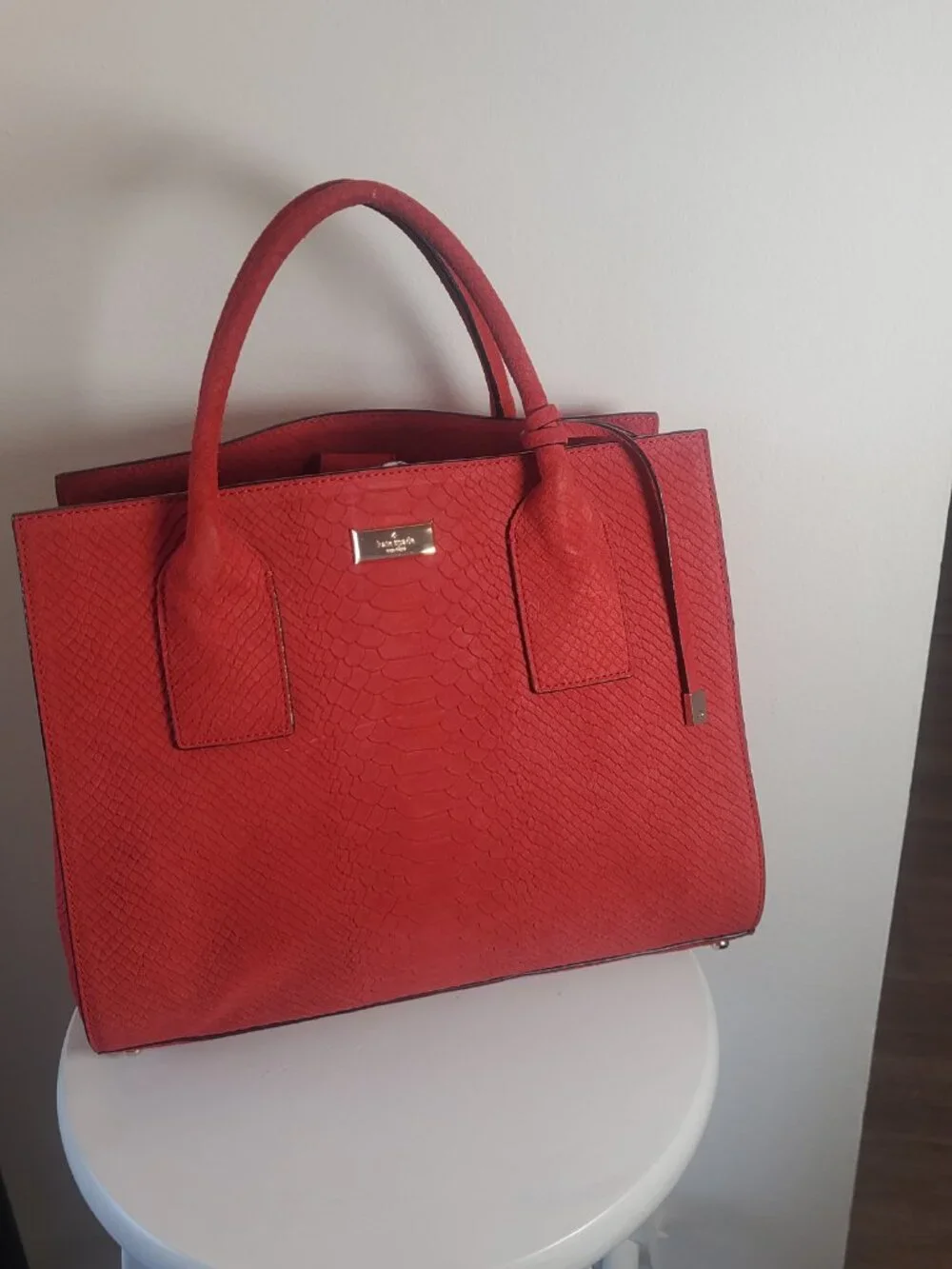 19. Kate Spade New York Red Embossed Suede Large Top Handle Bag